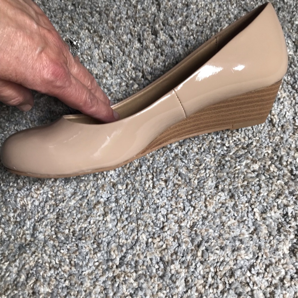 Nude wedge shoe. Only wore twice.